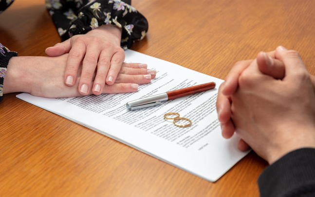 couple reviewing financial and parenting agreement documents
